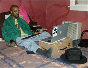 hannibal tabu, hard at work, typing away on a computer